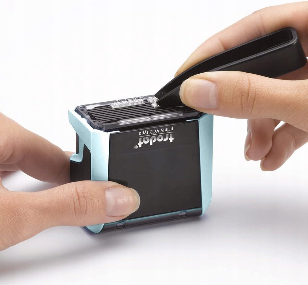 Samotuszujący stempel z automatycznym mechanizmem