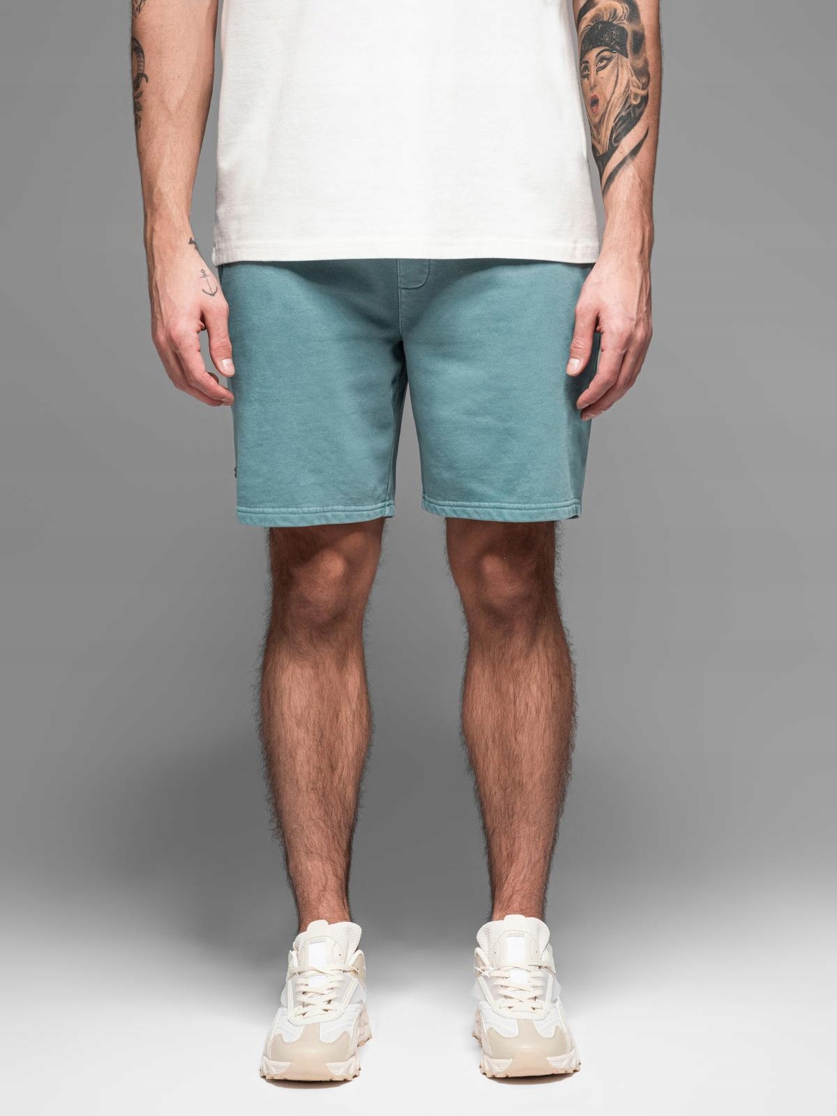 Męskie krótkie spodenki dresowe RELAXED FIT w stylu athleisure turkusowe V1 OM-SRWS-0122 – Komfort i styl na co dzień