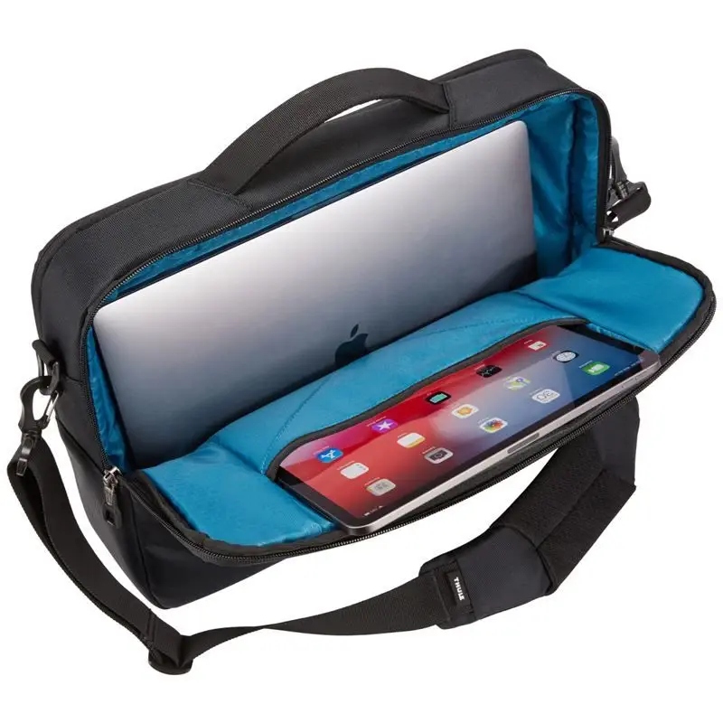 Funkcjonalność – bezpieczne mocowanie do torby na kółkach