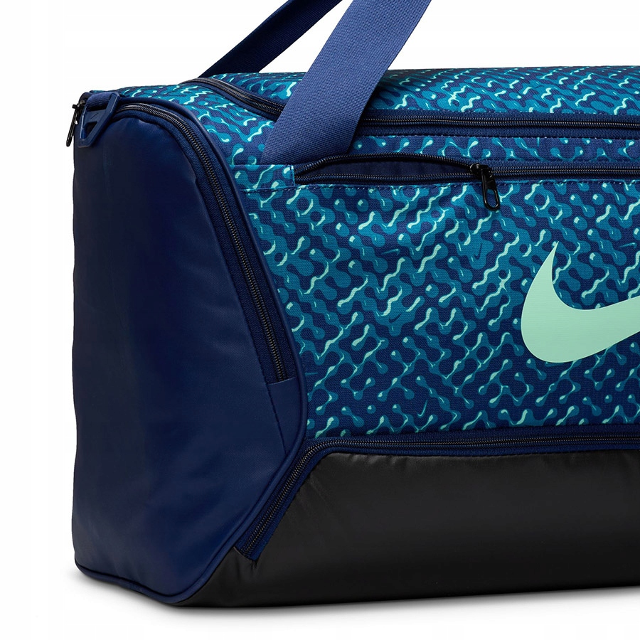 Praktyczne boczne kieszenie na bidon i drobiazgi