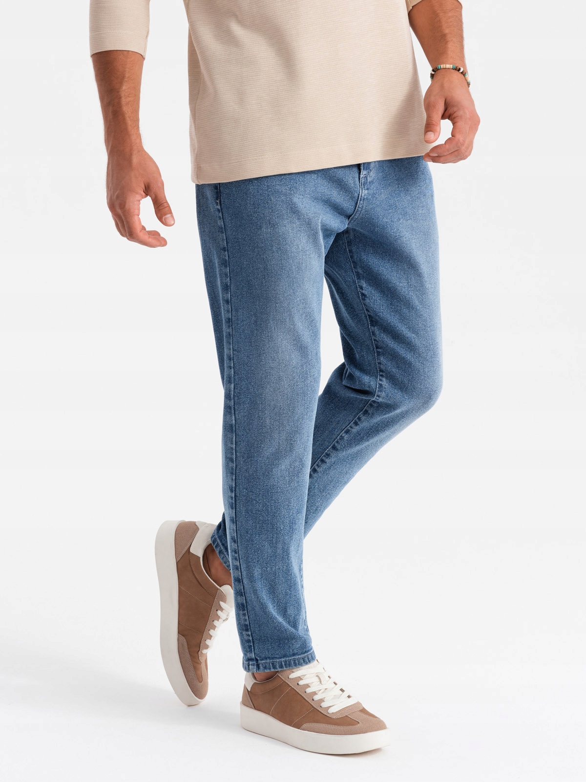 Męskie jeansowe spodnie CARROT FIT z delikatnymi przetarciami – niebieskie V1 OM-PADP-0162 XL