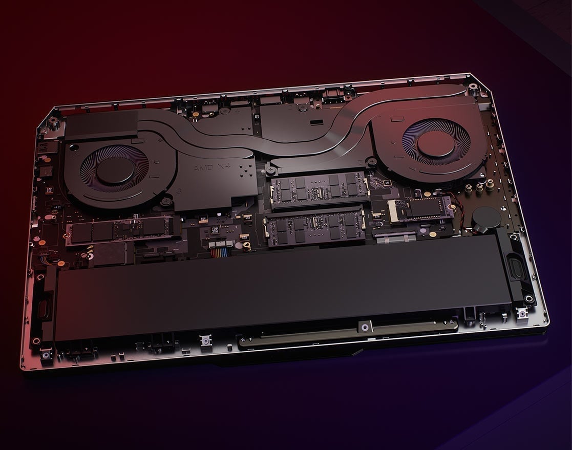 Laptop LOQ 15ARP9 pokazany bez obudowy, od spodu, widoczne różne podzespoły