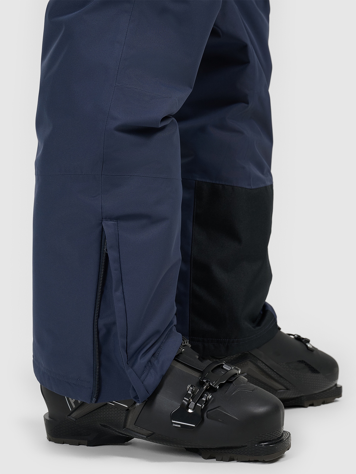 Trwałość i ochrona – Wzmocnienia u dołu nogawek i nogawki przeciwśnieżne