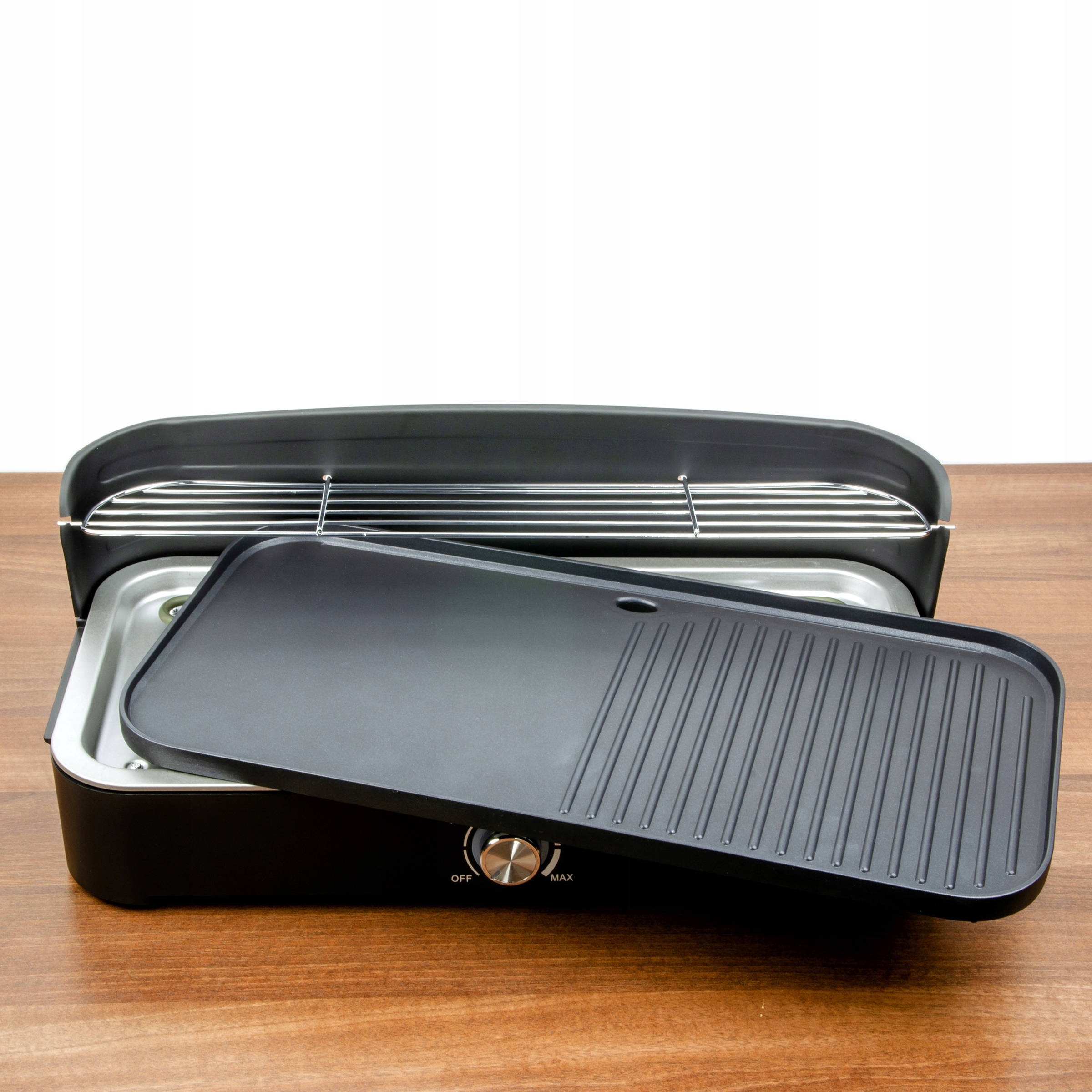 Łatwe czyszczenie dzięki zdejmowanej płycie grilla