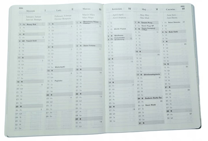 Funkcjonalność i estetyka – dodatkowe kieszenie i uchwyt na długopis