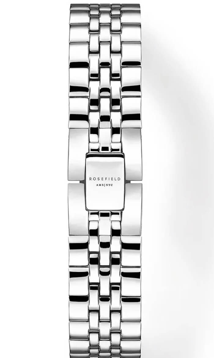 Stylowy design z czarną tarczą i kwadratową kopertą