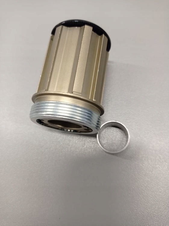Zestaw zawierający bębenek i adapter