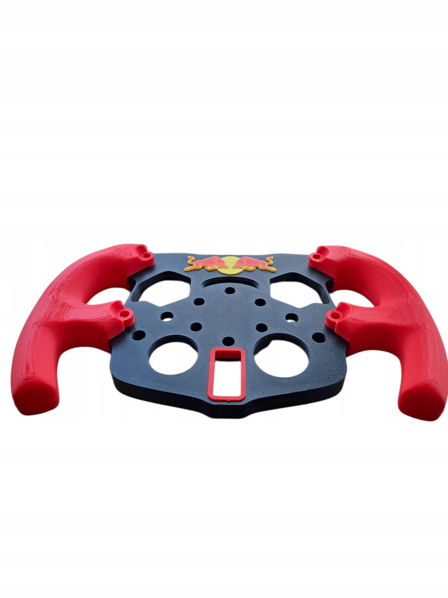 Zestaw zawiera emblematy Red Bull oraz F1