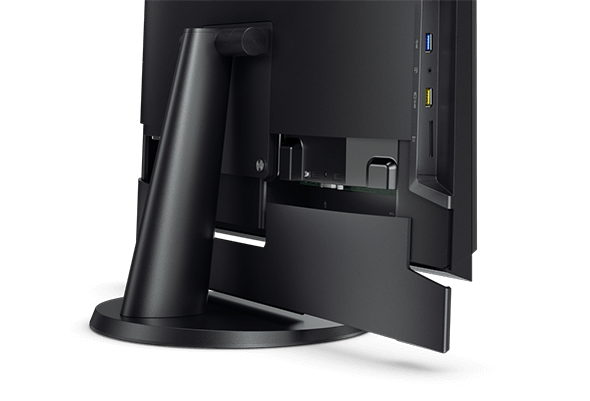 Back-side detail of power adapter cover on the Lenovo V310z all-in-one.