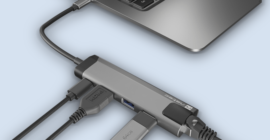 Wielopunktowy adapter USB-C z dwoma portami USB 3.0, wyjściem HDMI 4K, złączem USB-C PD i RJ45 Ethernet, podłączany do laptopa