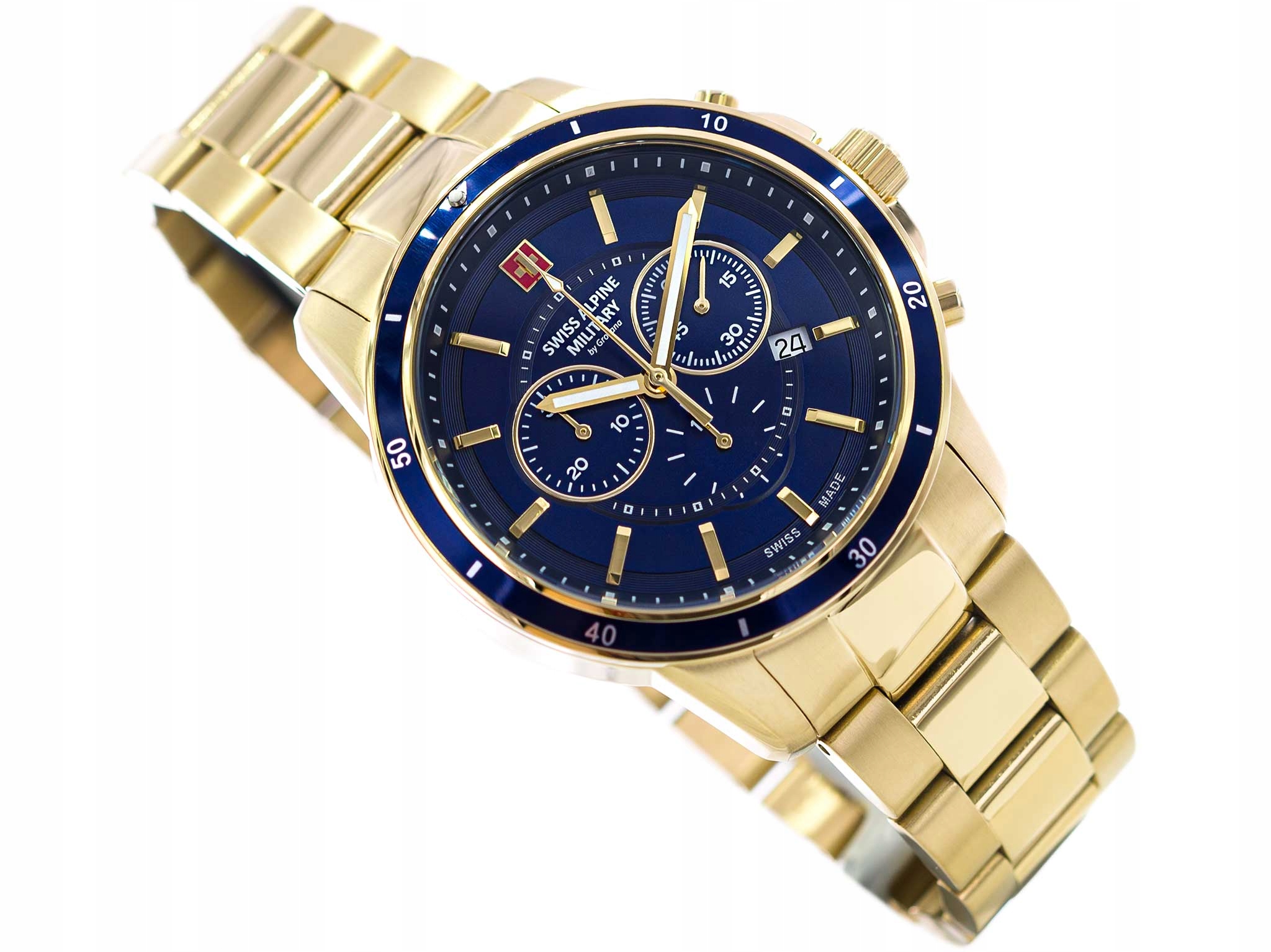 Kolorystyka i materiały – Złota koperta i granatowy cyferblat