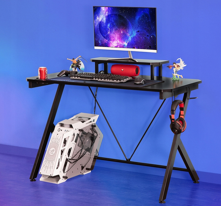 Dodatkowa półka na laptopa i uchwyty na słuchawki