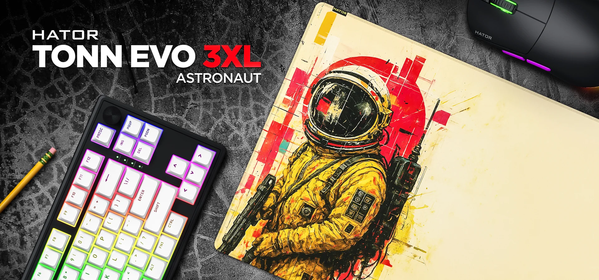 Powierzchnia HATOR Tonn Evo 3XL Astronaut z grafiką astronauty, obok klawiatura RGB i mysz gamingowa