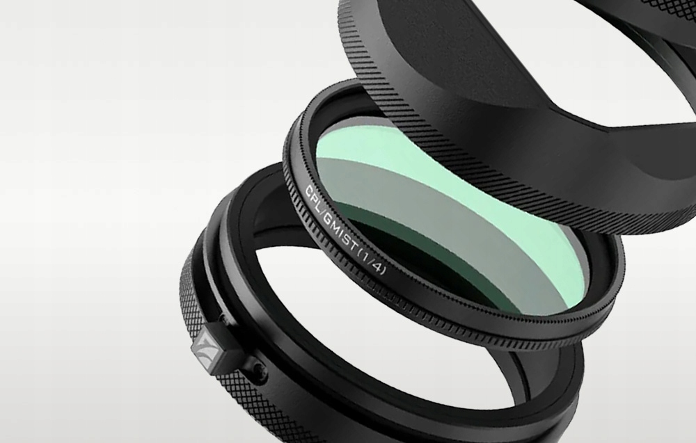 W zestawie: Pierścień adaptacyjny, filtr hybrydowy i osłona obiektywu