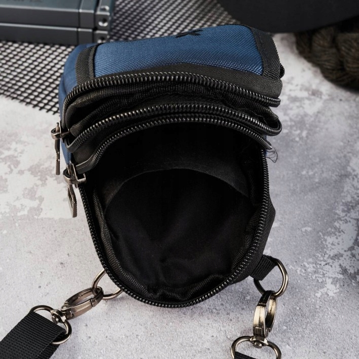 Funkcjonalne kieszenie i regulowany pasek – Komfort użytkowania