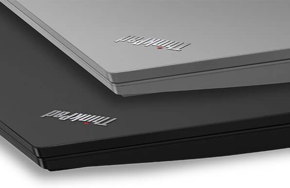 Two Lenovo ThinkPad E590 laptops stacked, showing both Silver and Black.