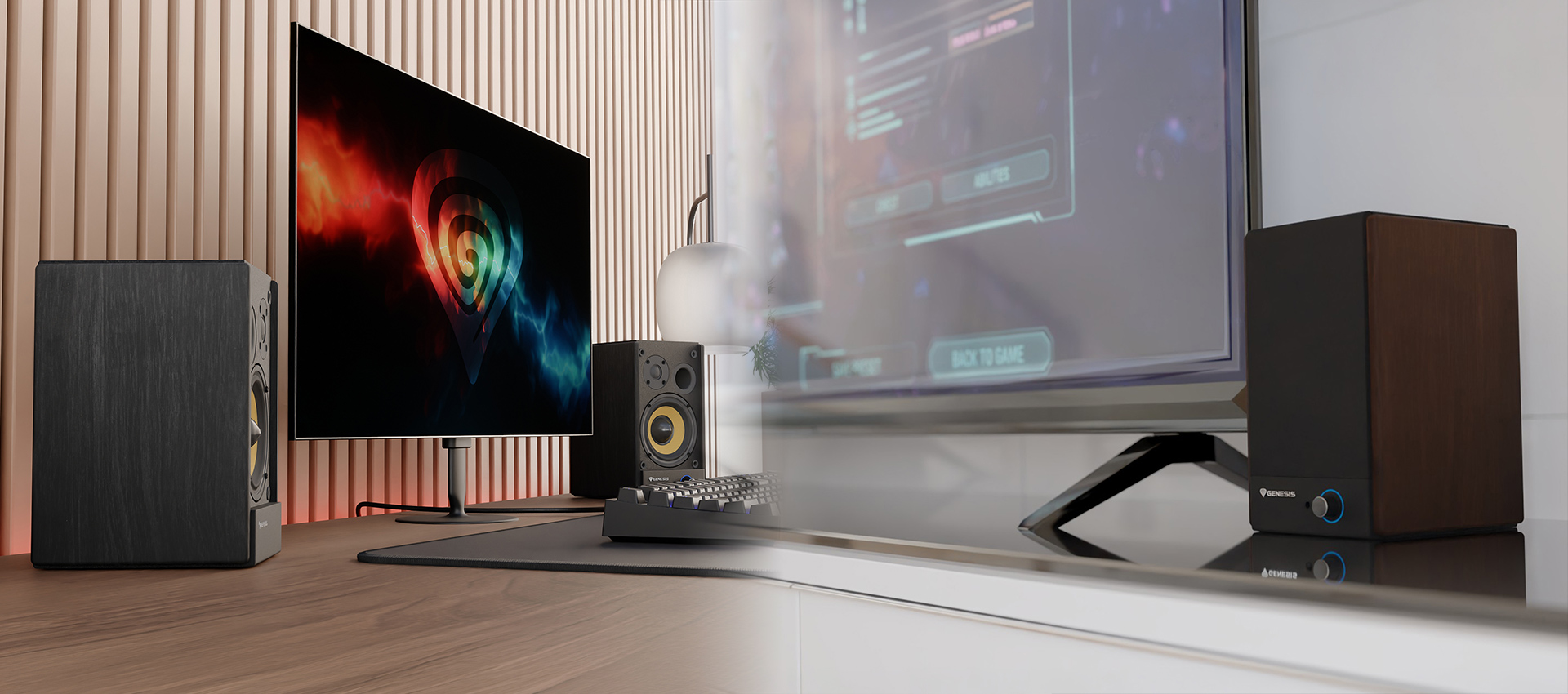 Zestaw komputerowy z dwoma głośnikami, monitorem i kontrolerem audio na drewnianej powierzchni.
