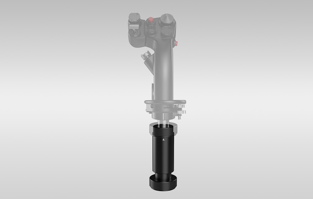 Moduł osi Z MOZA Racing AS003 zamontowany pionowo pod drążkiem na szarym tle.
