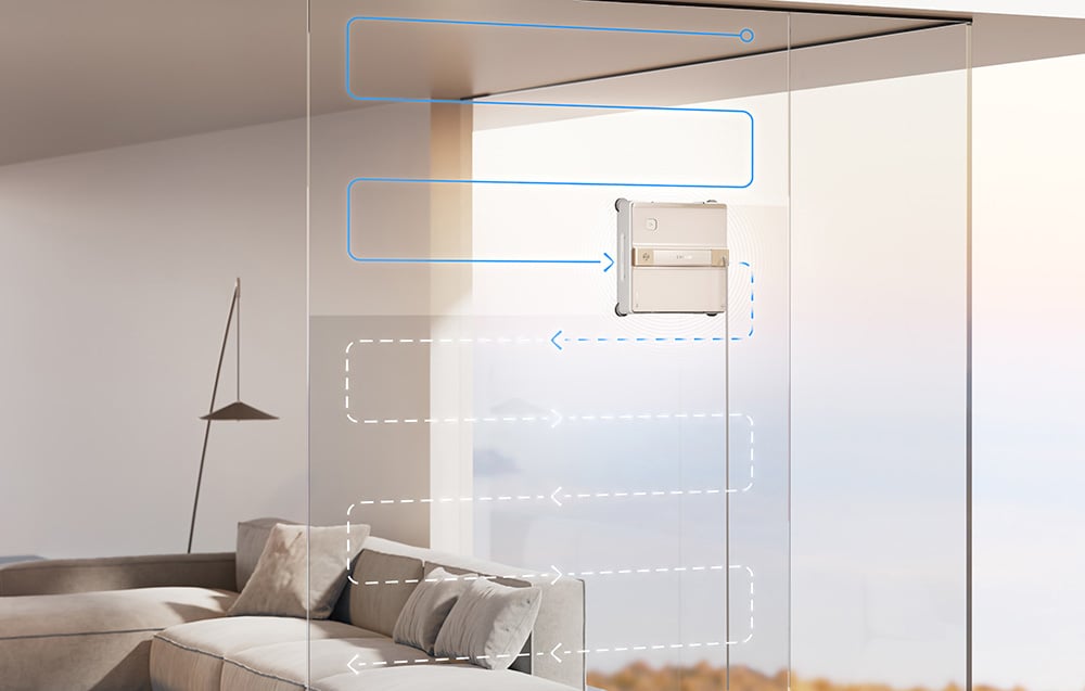 Robot Dreame C1 Station czyszczący dużą szybę w salonie, z wizualizacją schematu trasy sprzątania za pomocą niebieskich linii