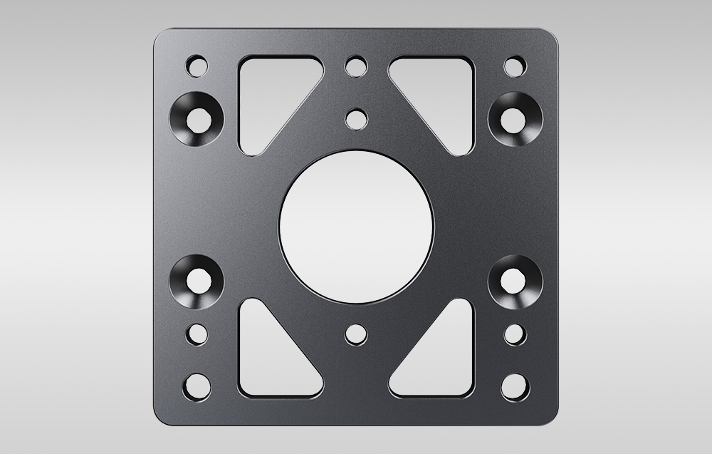 Płyta montażowa MOZA Racing RS049 w kolorze czarnym; widok z przodu na okrągły otwór centralny i układ otworów montażowych.