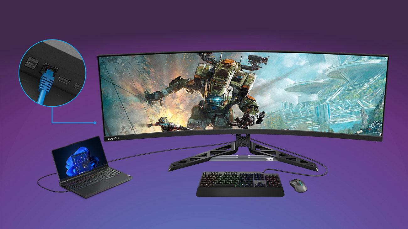 Monitor Lenovo R45w-30, na ekranie kolorowa grafika z wizualizacją gry komputerowej, widoczna podłączona klawiatura, mysz i laptop