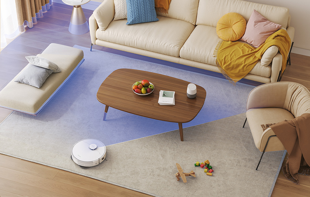 Robot sprzątający odkurza dywan w salonie. 