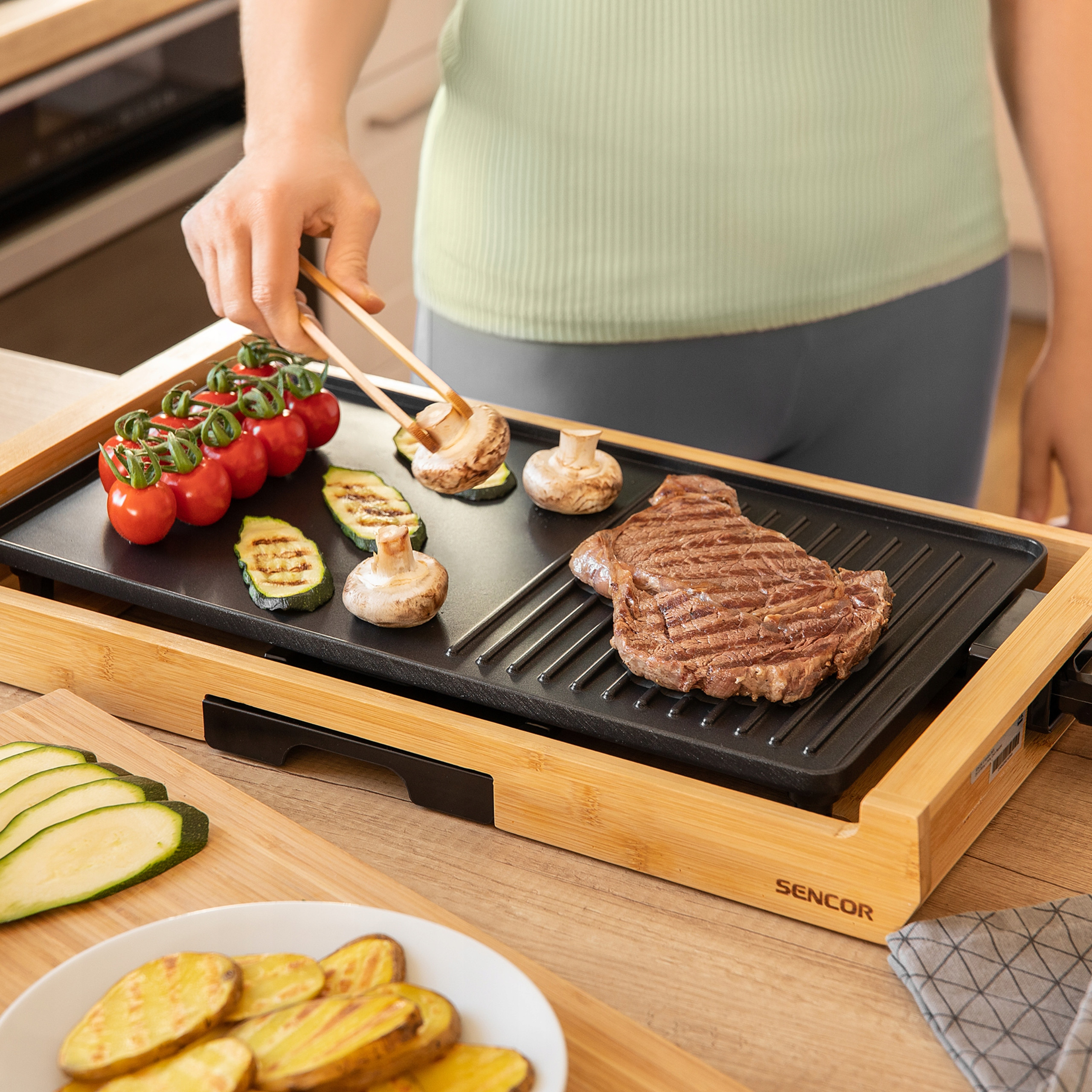 Regulacja temperatury – cztery poziomy dla perfekcyjnego grillowania