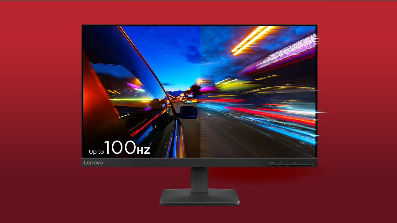 Monitor Lenovo L24-4e o częstotliwości odświeżania 100Hz, na ekranie bok samochodu jadącego ulicą i kolorowe światła 