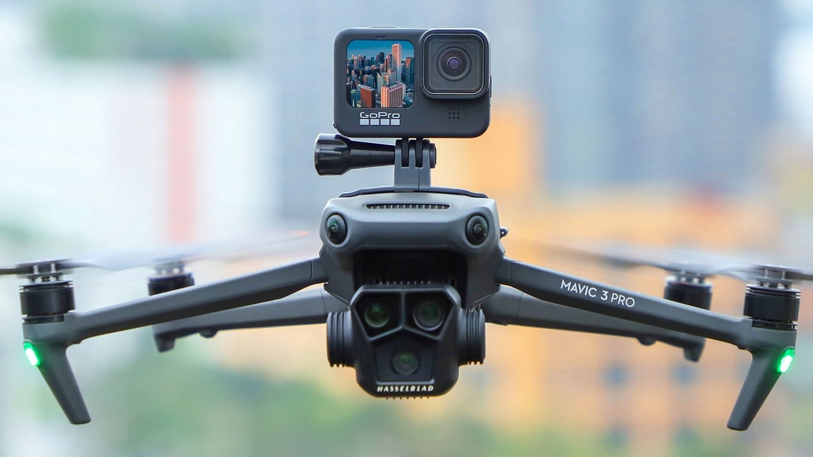 mocowanie-uchwyt-do-kamer-gopro-sjcam-xiaomi-insta360-sony-gwint-1-4-na-drona-dji-mavic-3-3-pro-3-classic-gz580-gy_o7782_11.jpg
