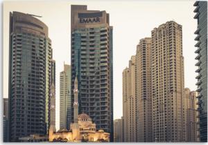 CaroGroup OBRAZ NA PŁÓTNIE DO BIURA Wieżowce w Dubaju 100x70 1