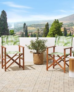 Beliani Zestaw 2 krzeseł ogrodowych akacjowy ciemne drewno z białym / wzór w tropikalne liście CINE! 2