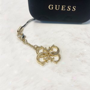 Guess Guess zawieszka GUCPM4GID Phone Strap 4G Glitter Charm 4