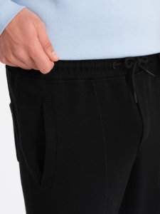 Ombre Spodnie męskie dresowe CARROT ze strukturalnej dzianiny - czarne V8 OM-PASK-0143 M 4