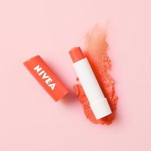 NIVEA_Pielęgnująca pomadka do ust Peach Shine 5,5ml 2