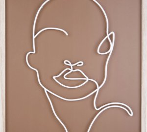 Dekoracja ścienna z metalowym motywem twarzy, ART LINE 3