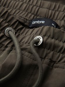 Męskie spodnie joggery z kieszeniami cargo i printem  ciemnooliwkowe V5 OM-PAJO-0200 XXL 7