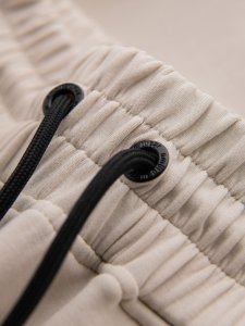 Męskie spodnie dresowe ze ściągaczami i ozdobnym zamkiem  piaskowe V6 OM-PASK-0226 XL 7