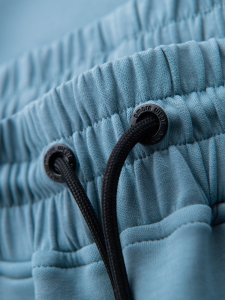 Spodnie dresowe męskie ze ściągaczami i ozdobnym zamkiem  jasnoniebieskie V4 OM-PASK-0226 XL 7