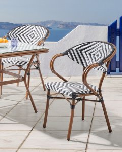 Beliani Zestaw 4 krzeseł ogrodowych CASPRI Technorattan Czarny/ white 4