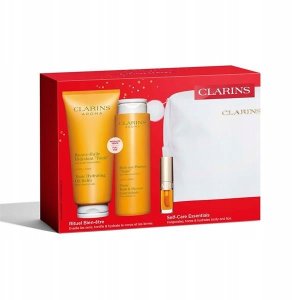 Clarins Set Clarins: Aroma, Essential Oils, Hydrating, Body Oil, 200 ml + Aroma, Essential Oils, Shower Gel, All Over The Body, 200 ml + Lip Confort, Lip Oil, 01, 1.4 ml *Miniature + Clarins, Zippered, GWP Textile Pouch, White Unisex 4