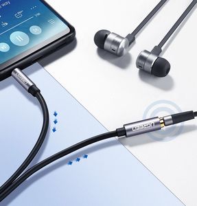 Kabel Ugreen Jack 3.5mm - Jack 3.5mm 1m srebrny (UGR220GRY) 5