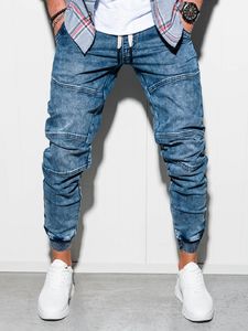 Ombre Spodnie męskie jeansowe joggery P551 - niebieskie S 1