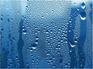 DecoNest Fototapeta - Krople wody na niebieskiej szybie - 200X154 1