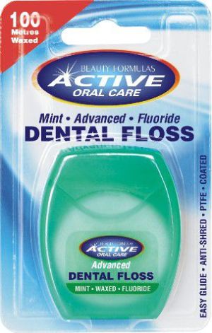 Active  Oral Care Nić dentystyczna udoskonalona miętowa woskowana z fluorem - 722035 1