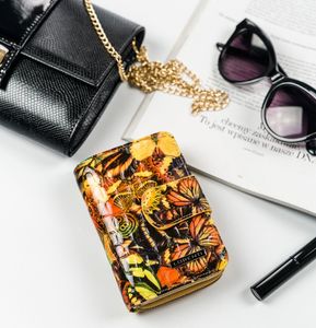 Lorenti Skórzany, lakierowany portfel damski pionowy w kolorowe motyle NoSize 2