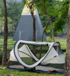 DERYAN Łóżeczko turystyczne Peuter Luxe z moskitierą, kremowe 4