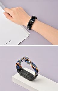 Hurtel Strap Fabric opaska do Xiaomi Mi Band 6 / 5 / 4 / 3 pleciony materiałowy pasek bransoletka czerwony 8