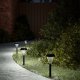 Kinkiet vidaXL Solarne lampki ogrodowe, z kolcem, 12 szt., białe światło 1