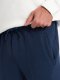 Ombre Spodnie męskie dresowe CARROT ze strukturalnej dzianiny - ciemnoniebieskie V5 OM-PASK-0143 XL 3