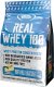 Real Pharm REAL PHARM REAL WHEY 100 KONCENTRAT BIAŁKA PROSZEK 700G - Dzika truskawka-biała czekolada 3